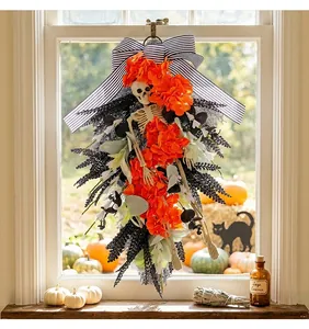 Close-up of Halloween hanging wreath with skeleton and vibrant orange hydrangeas