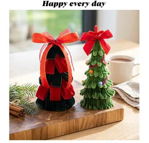 Detail view of cozy handmade velvet loop and pipe cleaner mini Christmas trees