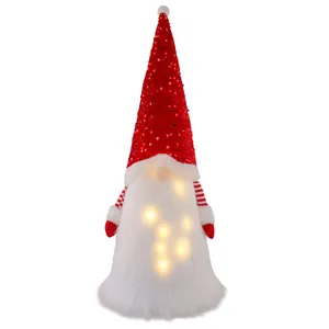 LED beleuchtete Weihnachtsgnom Figur mit rotem Paillettenhut und warmweißem Leuchteffekt