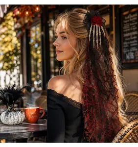 Gothic Halloween hair clip detail featuring skeleton hand and red roses on long lace veil