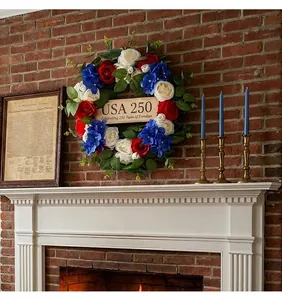 Floral wreath for US 250th anniversary decoration hanging on fireplace brick wall