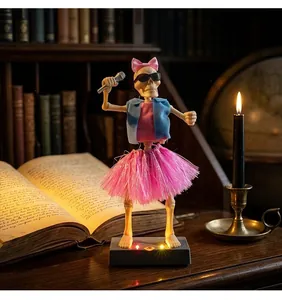 Animated glowing singing skeleton toy with pink skirt and bow in library setting