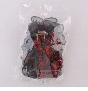 Gothic red and black mesh Halloween hair clip presented in a clear plastic bag packaging.