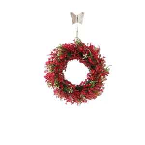 Red artificial Christmas wreath with white butterfly hook for holiday door decoration