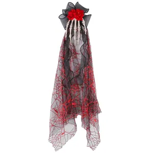 Gothic Halloween skeleton hand hair clip featuring red roses and a long black lace veil