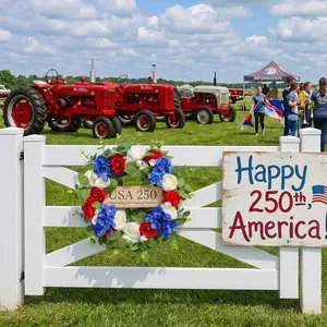 Patriotic red, white, and blue artificial flower wreath for USA 250th anniversary decor.
