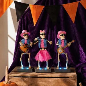 Animated Halloween skeleton band figurines with blue LED lights and musical feature
