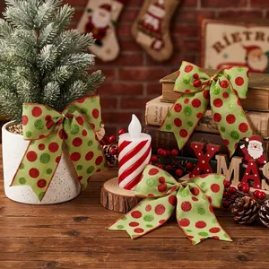 Festive Christmas green bows with red glitter polka dots for tree and wreath decoration