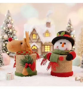 Detailed view of handmade Christmas snowman and reindeer burlap candy jars for gifts
