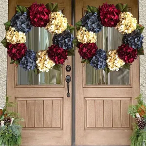 Patriotic Independence Day hydrangea wreaths in red white and blue on front doors