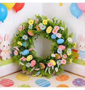 Close-up detail of artificial Easter wreath with colorful speckled eggs and daisies