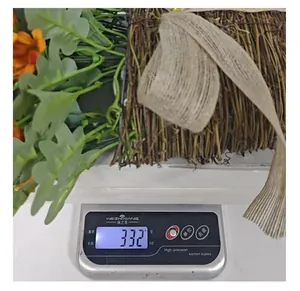 Detail view showing the weight measurement of the autumn sunflower basket wreath at 332g