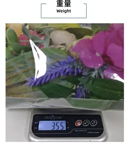 Detail view showing the 355g weight measurement of an autumn harvest peony wreath