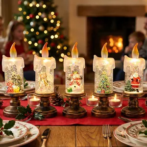 Set di 5 candele LED con palline di neve e figurine per decorazioni natalizie da tavola.