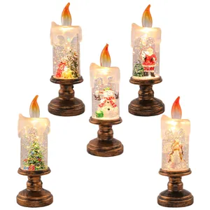 Set di 5 candele natalizie a LED con glitter palla di neve e figure festive di Natale.