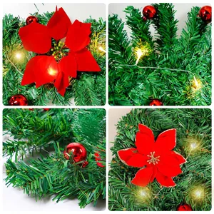 Detaillierte Nahaufnahme einer Weihnachtsgirlande mit roten Weihnachtssternen und LEDs