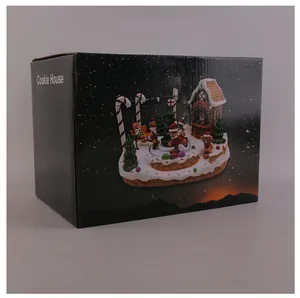Retail packaging box for the glowing gingerbread house Christmas music box decoration