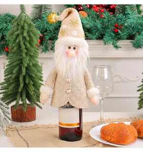 Champagne gold Christmas gnome wine bottle cover with plush beard and sequin hat