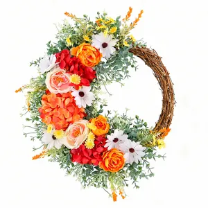 Colorful artificial rose and daisy wreath with natural vine base for door decor