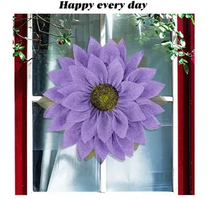 Handmade purple burlap sunflower wreath for festive home door and wall decorations.