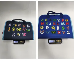 Detailed view of children's felt busy board showing accurate weight measurements
