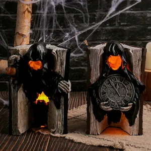 Statuette di libri fantasma in resina di Halloween con luci LED arancioni per decorazioni