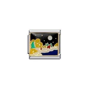 Close-up of a DIY stainless steel modular charm with night camping enamel scene