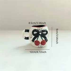 Detailed size specifications and measurements for the cherry and bow ceramic mug