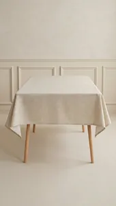 Elegant high-quality beige linen tablecloth set in a minimalist Japanese-style home dining area.