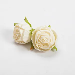 Detailed macro shot of vintage cream silk rosebuds with realistic burnt edges for DIY decor