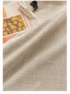 Close-up of thick Japanese style linen tablecloth showing premium woven texture