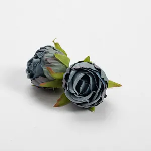 Close-up of vintage blue-grey artificial rose buds for DIY crafts and decor