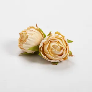Close-up macro view of artificial vintage cream roses with realistic burnt edge details