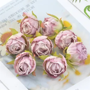 Detailed macro view of vintage pink silk artificial rose buds for DIY craft decorations