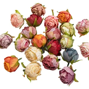 Assorted vintage silk rose buds with burnt edges for DIY wedding decor and crafts