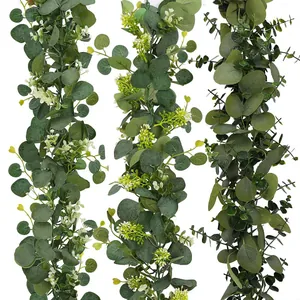 Detailed view of artificial eucalyptus and gypsophila vines showing leaf and flower textures