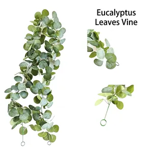 Detailed view of artificial eucalyptus leaf garland vine with realistic frosted texture