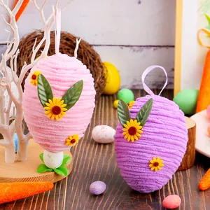 Woven chenille Easter egg ornaments with sunflower and leaf accents for spring decor