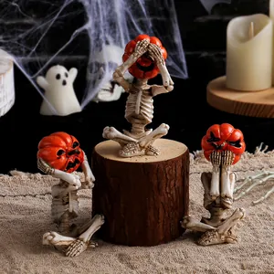 Halloween pumpkin head skeleton figurines in meditation yoga poses for home decor