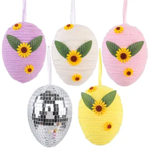 Set of colorful knitted Easter egg hanging ornaments with sunflower and disco mirror details