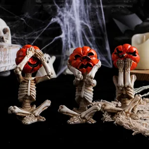 Three spooky Halloween pumpkin head skeleton figurines in see hear speak no evil poses
