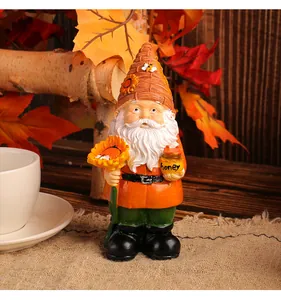 Detailed resin garden gnome figurine holding a large sunflower and yellow honey pot
