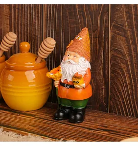 Macro detail of a garden gnome figurine with honey pot in a rustic wooden setting