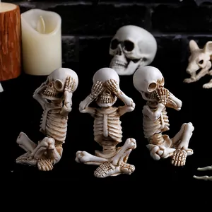 Set of three See-Hear-Speak No Evil resin skeleton figurines for Halloween decor.