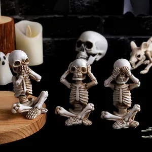 Set of 3 Halloween resin skeleton figurines in Hear See Speak no evil poses