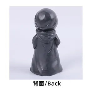 Back view detail of a hooded Halloween skeleton resin figurine with robe texture