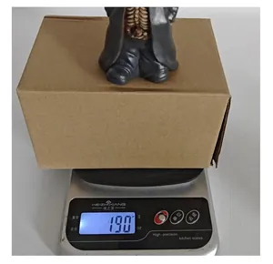 Macro view showing the 190 gram weight measurement of this Halloween resin skeleton figurine