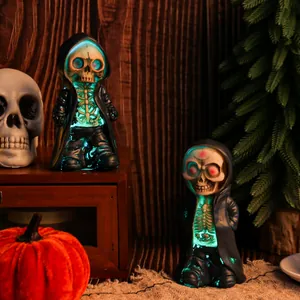 Glowing Halloween skeleton figurine in black robe, resin resin craft for spooky decor.