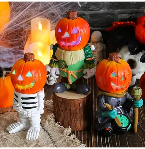 Set aus drei LED-Halloween-Kürbiskopf-Harzfiguren für festliche Tischdekoration.