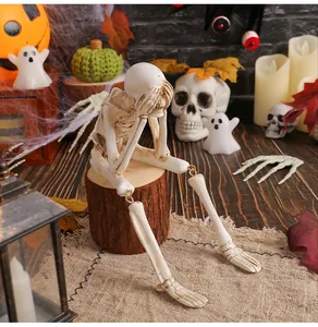 Detailed view of a 'see no evil' skeleton resin figurine for spooky Halloween decor